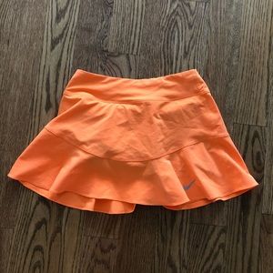 Bright orange Nike tennis skirt